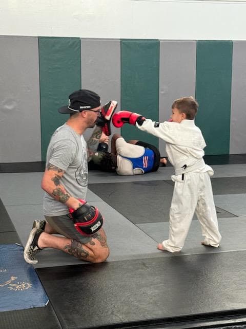 child participating in martial arts