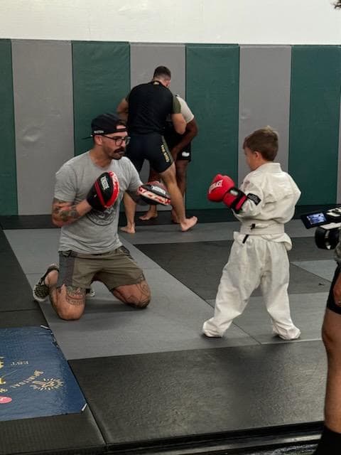 child participating in martial arts